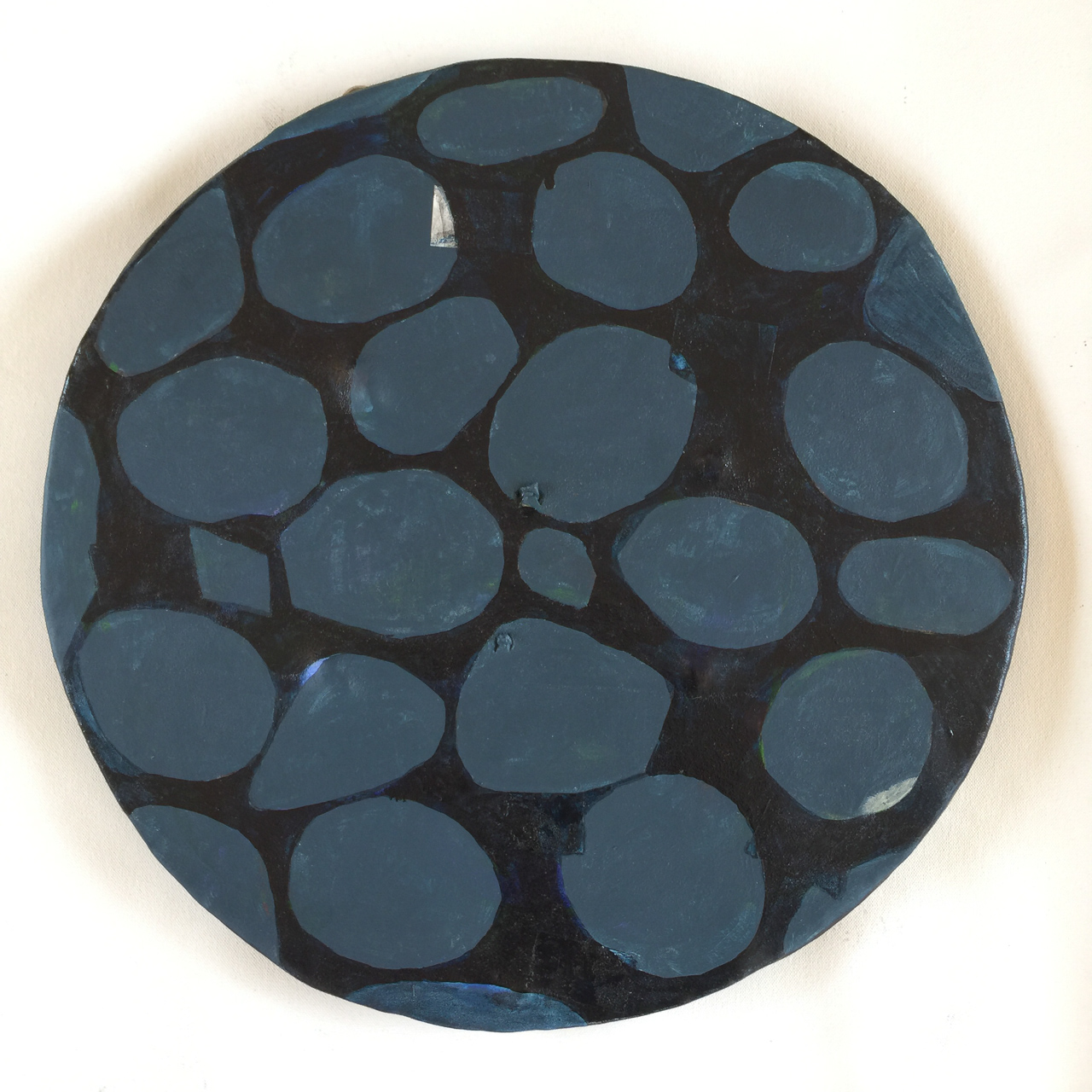 Mineral blue, acrylic on found suede circle, 16.5 diameter